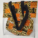 Tote bag with a geometric pattern in orange, black, and yellow