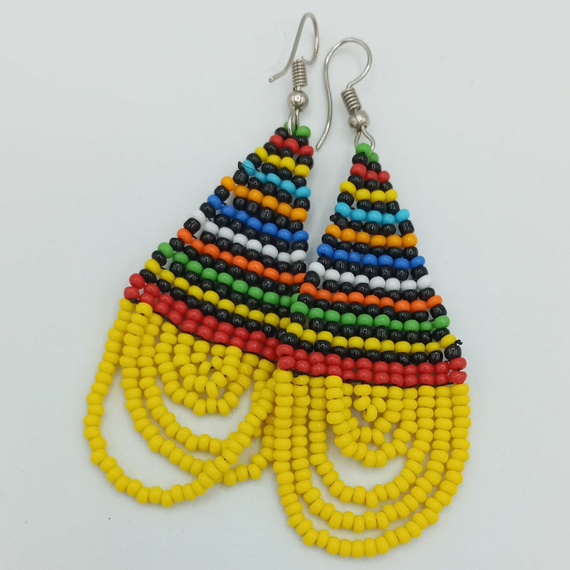 Explore our range of unique handcrafted beaded earrings. Find the perfect pair to suit your style and express yourself, or gift to a loved one. Beaded necklace. Ankara necklace. Semi-precious necklace. Gemstone necklace. Bracelets. Earrings.