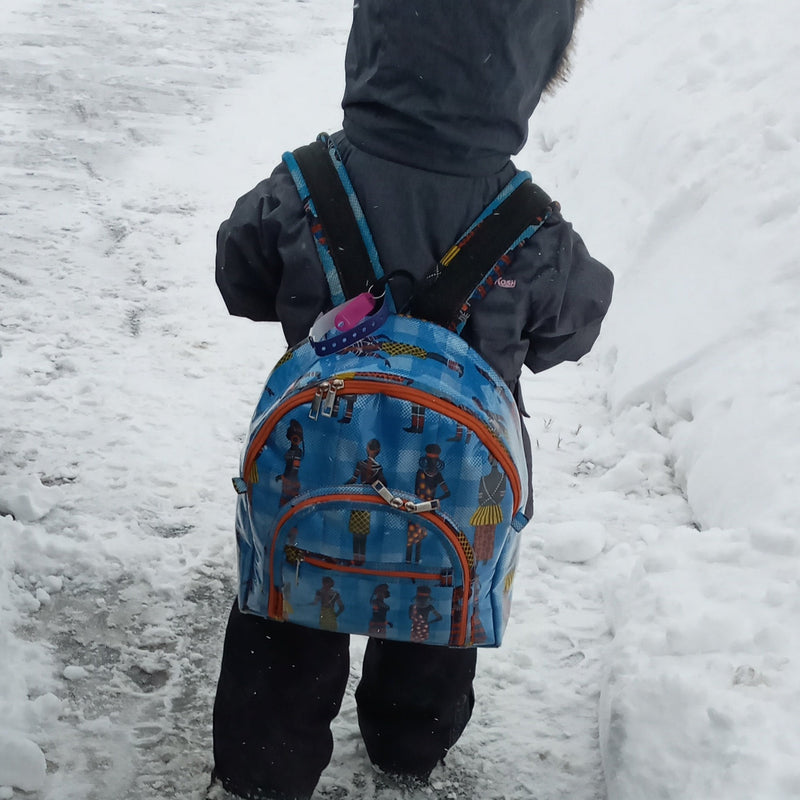 Made from durable, water-resistant plastic, the Kids Ankara Waterproof Backpack is made to stand up to those wet school days. Check out our unique handmade bags.