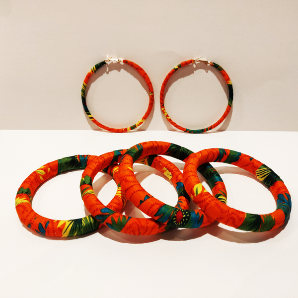 Check out our handmade bracelets and earrings selection. Ankara. Wax. Button earring.