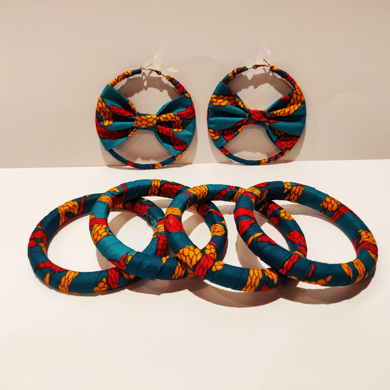 Check out our handmade bracelets and earrings selection. Ankara. Wax. Button earring.