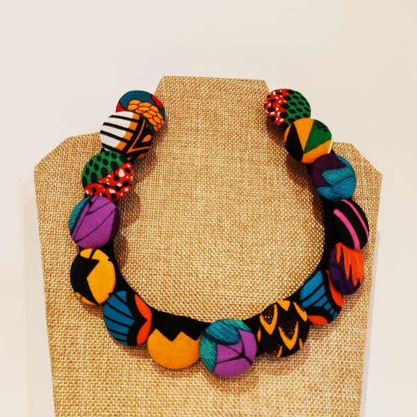 Explore our range of unique handcrafted necklaces. Find the perfect necklace to suit your style and express yourself, or gift to a loved one. Beaded necklace. Ankara necklace. Semi-precious necklace. Gemstone necklace.