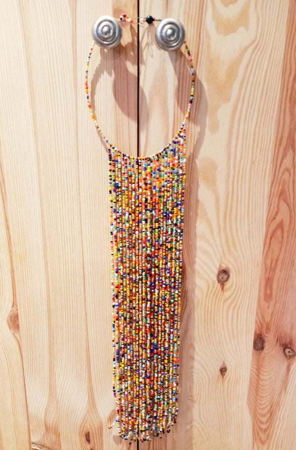 Explore our range of unique handcrafted necklaces. Find the perfect necklace to suit your style and express yourself, or gift to a loved one. Beaded necklace. Ankara necklace. Semi-precious necklace. Gemstone necklace.