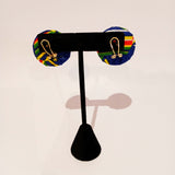 Check out our handmade bracelets and earrings selection. Ankara. Wax. Button earring.