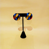 Check out our handmade bracelets and earrings selection. Ankara. Wax. Button earring.