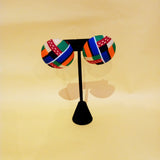 Check out our handmade bracelets and earrings selection. Ankara. Wax. Button earring.