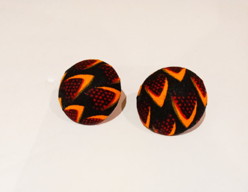 Check out our handmade bracelets and earrings selection. Ankara. Wax. Button earring.