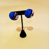 Check out our handmade bracelets and earrings selection. Ankara. Wax. Button earring.