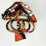 Check out our handmade bracelets and earrings selection. Ankara. Wax. Button earring.