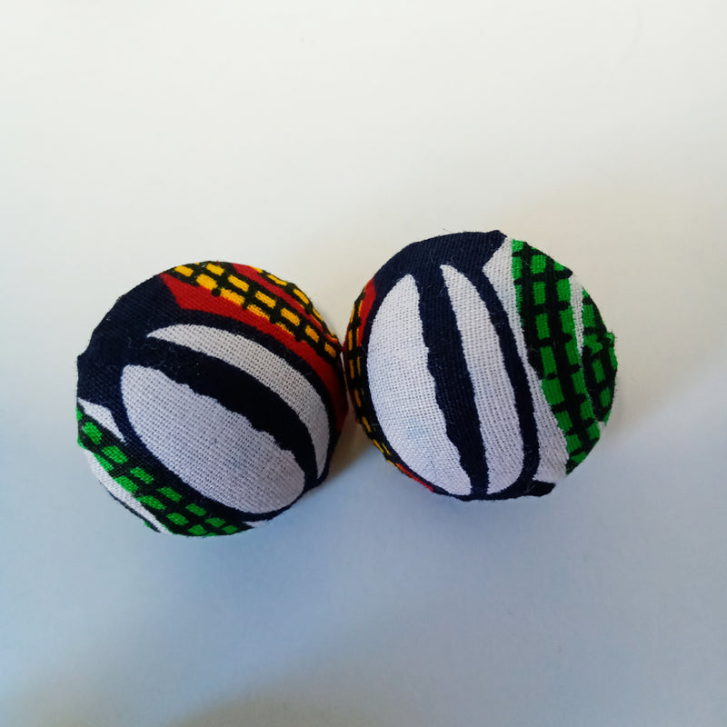 Check out our handmade bracelets and earrings selection. Ankara. Wax. Button earring.