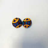 Check out our handmade bracelets and earrings selection. Ankara. Wax. Button earring.