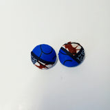 Check out our handmade bracelets and earrings selection. Ankara. Wax. Button earring.