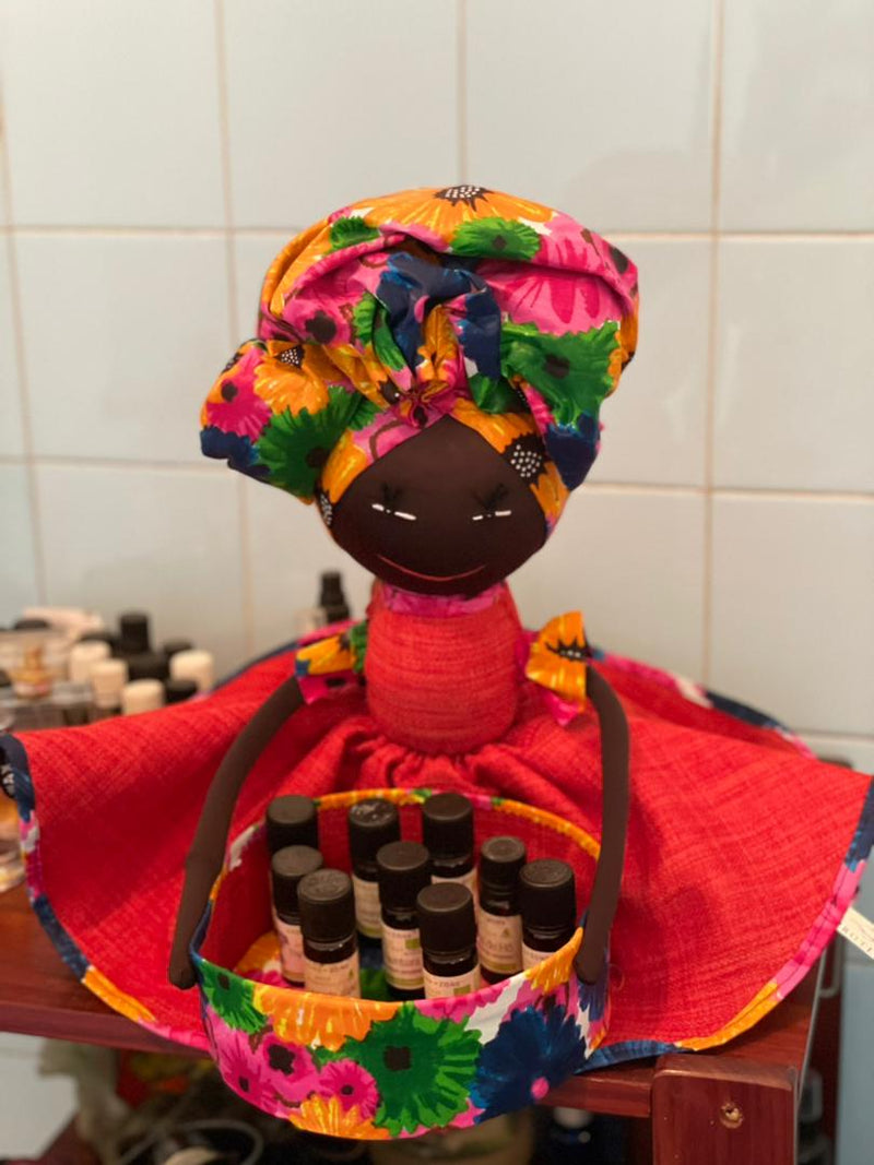 Brighten your space with this gorgeous handmade doll made with African print. Use for storage or simply décor. Shop our unique handmade pieces made of Ankara. 